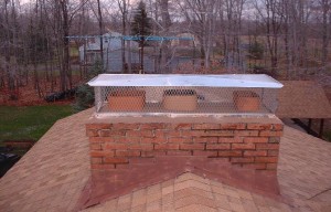 Installing a chimney cap screen cover